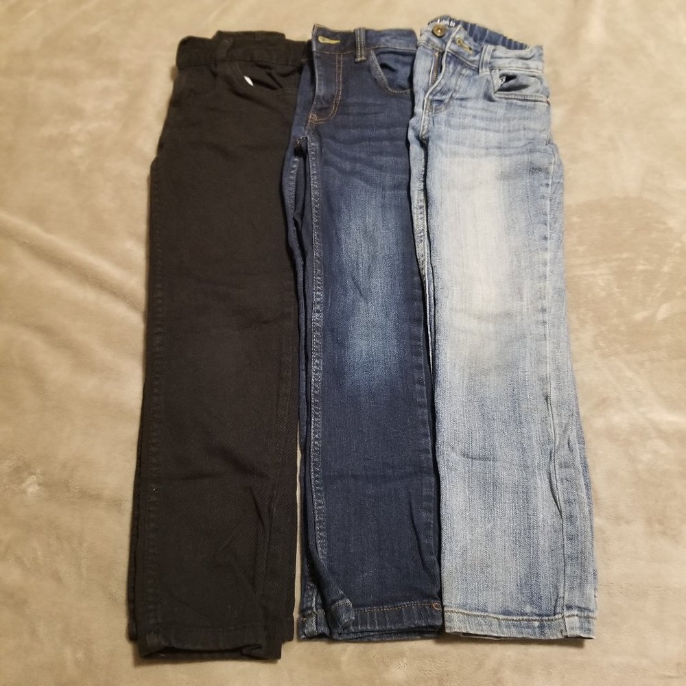 Boys Size 7 - 3 pairs of slim fit jeans (2 blue, 1 black)